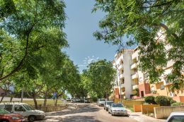 Modern T2 apartment with private roof terrace in green residential area in Tavira