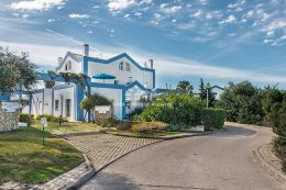 Well-presented townhouse enjoying a large terrace with open views and pool in Tavira