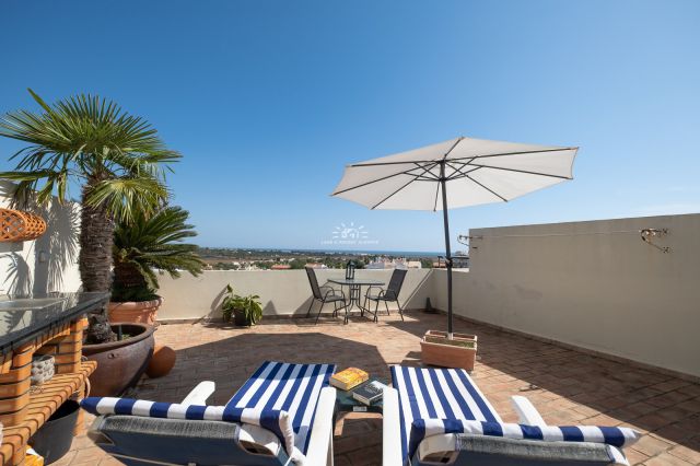 Private terrace with outdoor kitchen and seaview