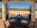 Modern top floor 2-bed apartment with large private roof terrace in Tavira