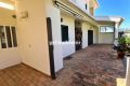Well-maintained semi-detached villa with small garden close to town and beach
