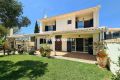 Well-maintained semi-detached villa with small garden close to town and beach