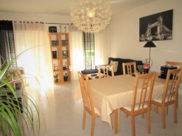 2-bed top floor apartment in the traditional village...