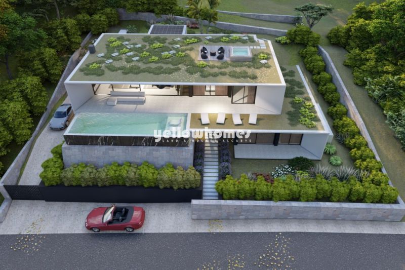 Building plot with project for a modern 4-bedroom villa with infinity pool