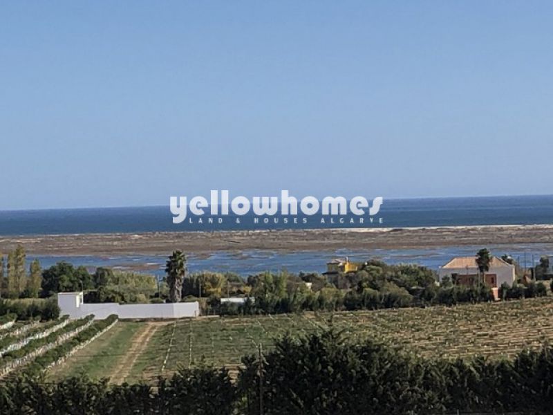 2-bed apartment with pool and large terrace font line of Ria Formosa