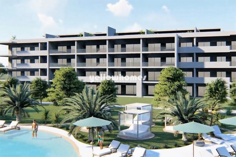 Spacious 3 bed apartment under construction with private garden near Alvor